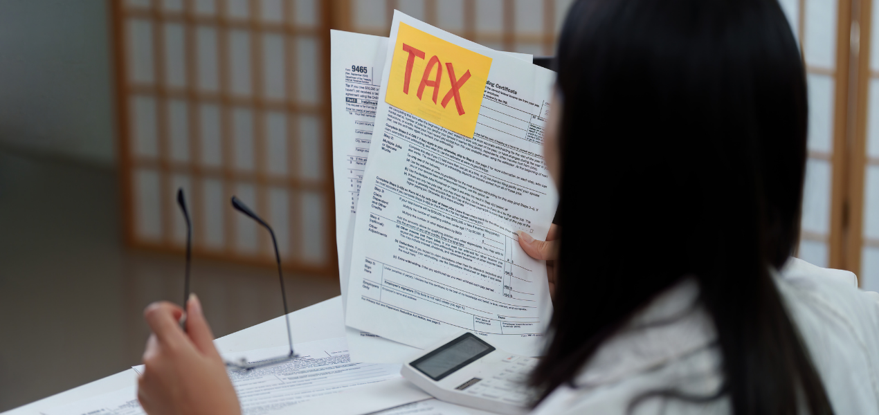 A person reviewing tax documents