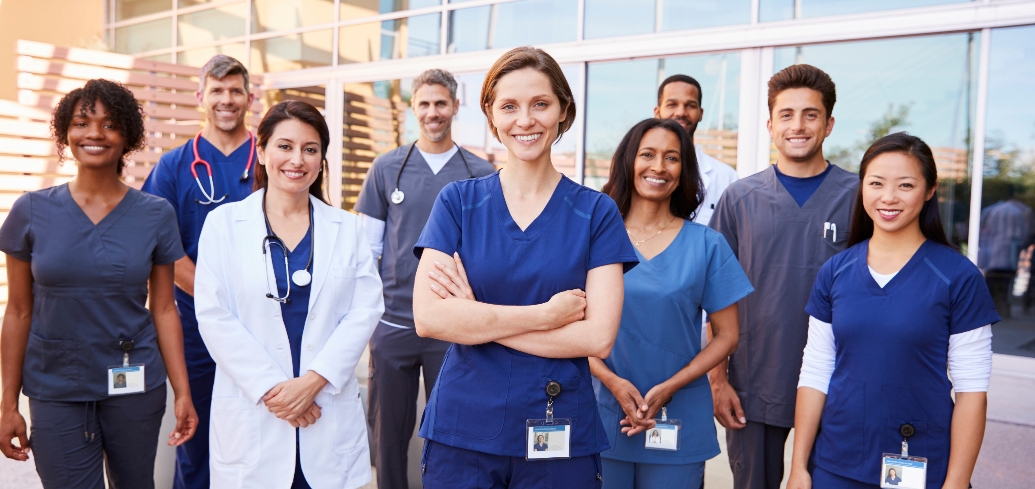 Healthcare professionals outside a clinic